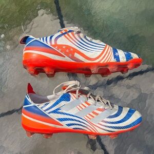 Adidas boys size 5 1/2 White, Orange and Blue Striped Cleats.